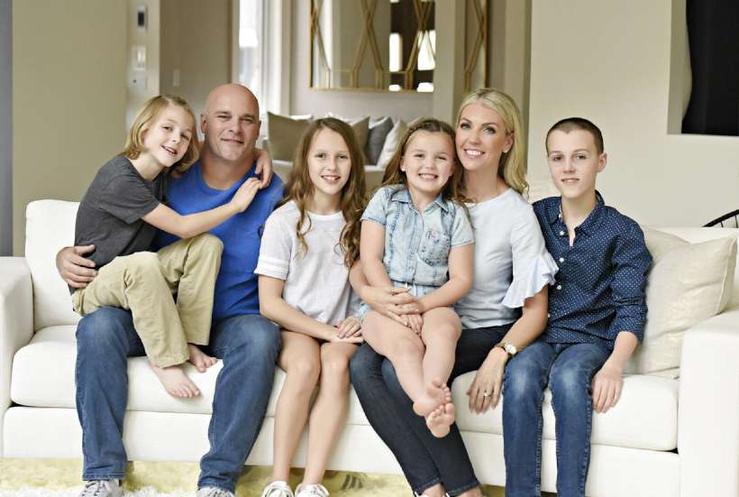 Bryan Baemuler with his wife and children