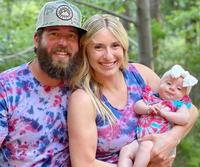 Jasmine Roth with her husband, Brett Roth and baby