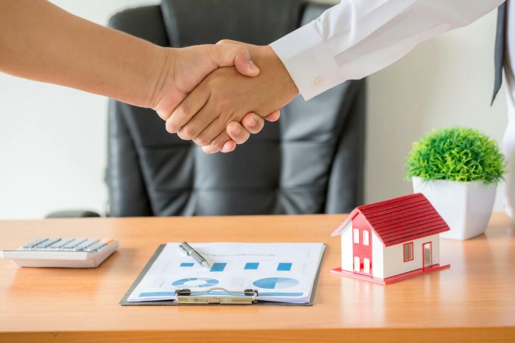 Image of Agent and Client shaking hands
