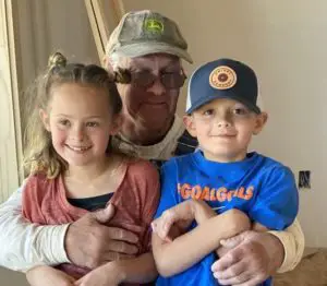 Image of Chase Looney father Joe Looney with his grand Kids